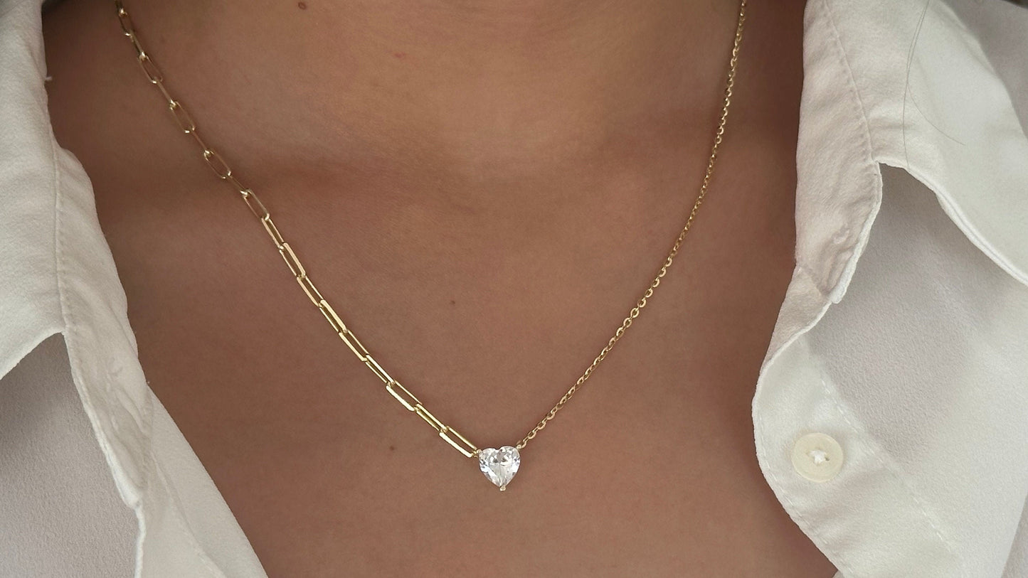 A gold chain necklace with a heart-shaped pendant featuring a clear gemstone. The chain is made of two different styles, one with a more delicate chain and the other with a thicker, more chunky chain. 925 Sterling Silver 14k Gold Plated - CZ Diamond - Handmade Jewelry