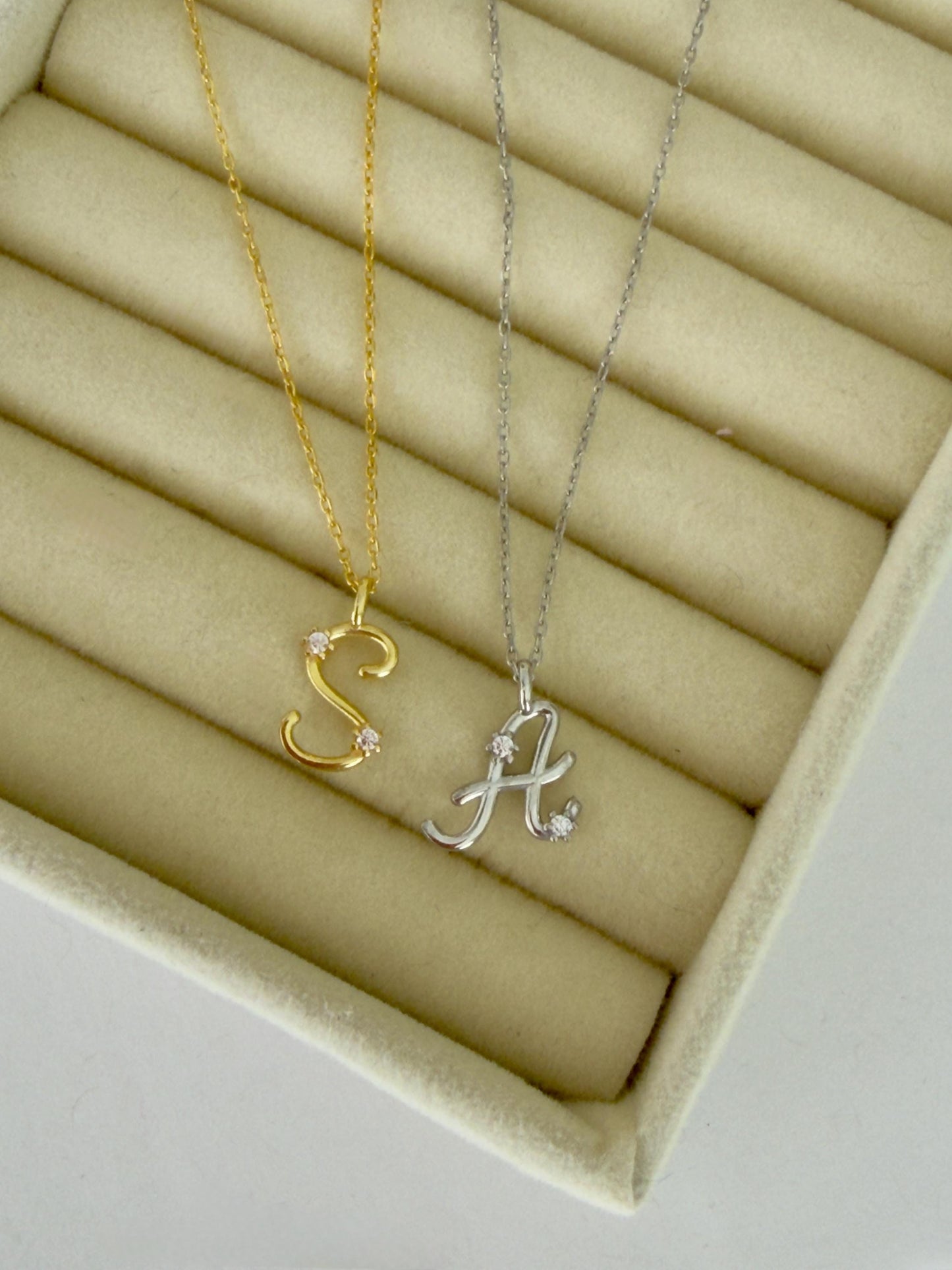 Layered initial necklace styling idea