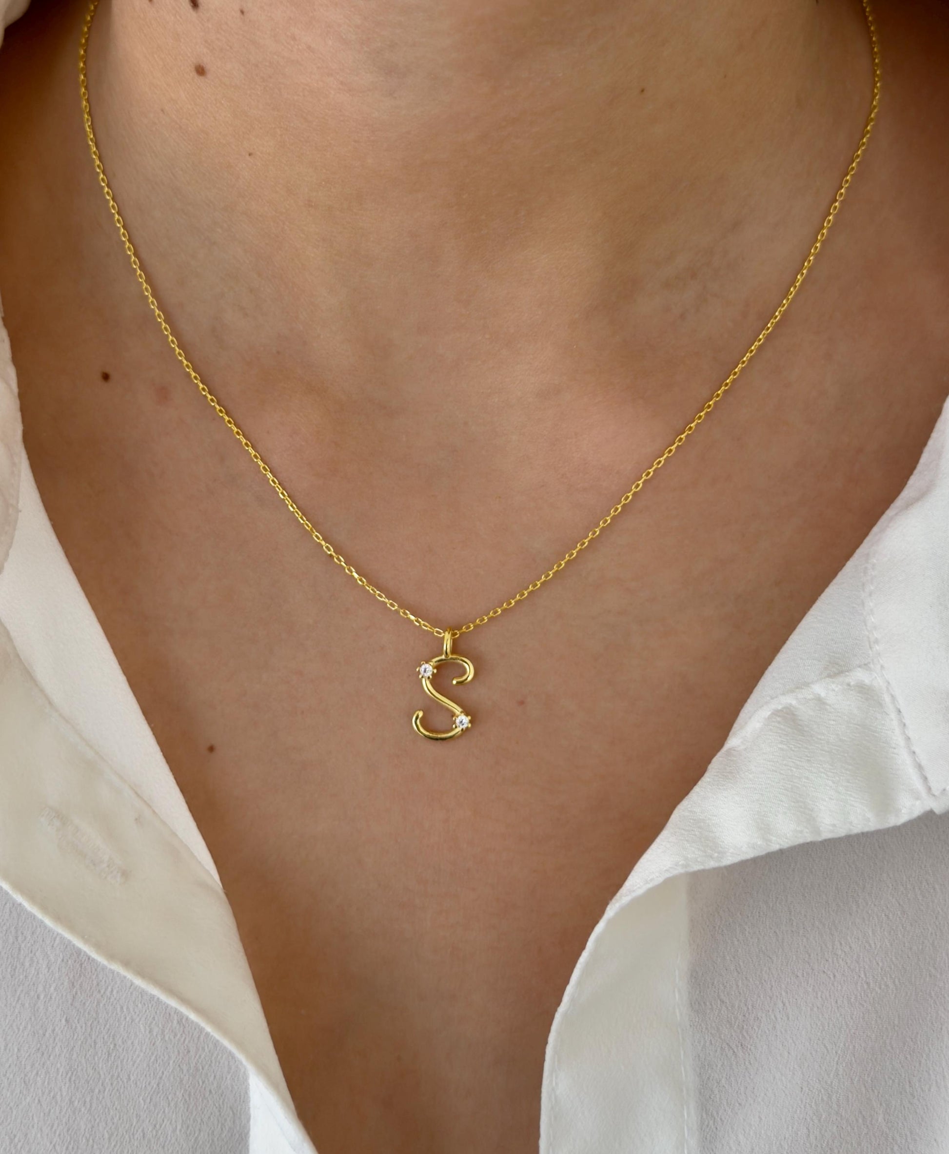 Gold initial necklace with cubic zirconia stone