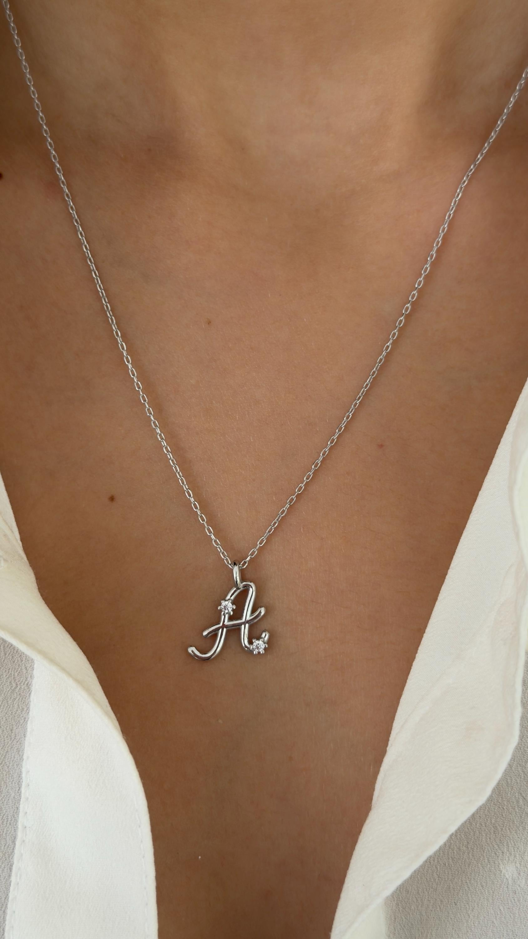 Sterling silver letter necklace with CZ