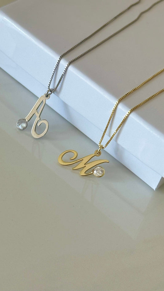 Close-up of 925 sterling silver initial diamond pendant necklace, handcrafted personalized design by Shineliz