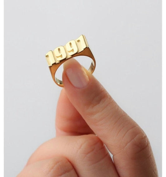Personalized gold year ring with raised date numbers in sterling silver