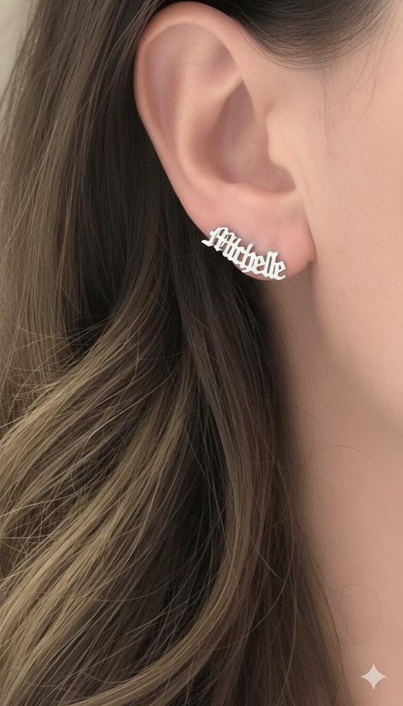 Custom word earrings shown as personalized gift for bridesmaids.