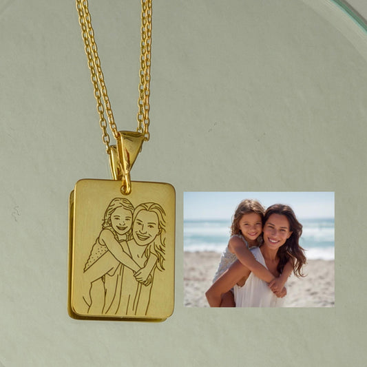 Custom engraved photo necklace in sterling silver.