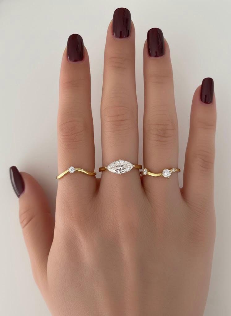 Adjustable stacking rings with clear CZ stones