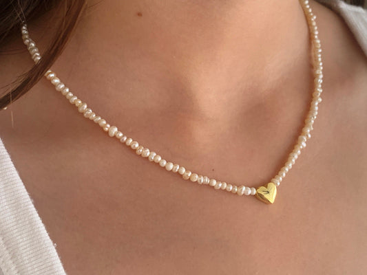 Dainty pearl choker necklace with freshwater pearls and 3D heart pendant. A timeless jewelry gift for her in sterling silver, gold, or rose gold.