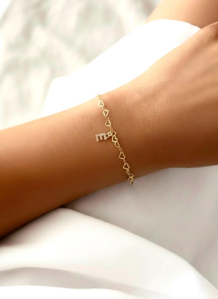 Sterling silver diamond initial bracelet with delicate heart chain.