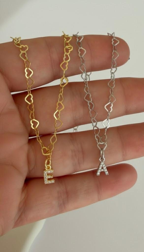 Personalized jewelry gift for her featuring CZ initial charm bracelet.