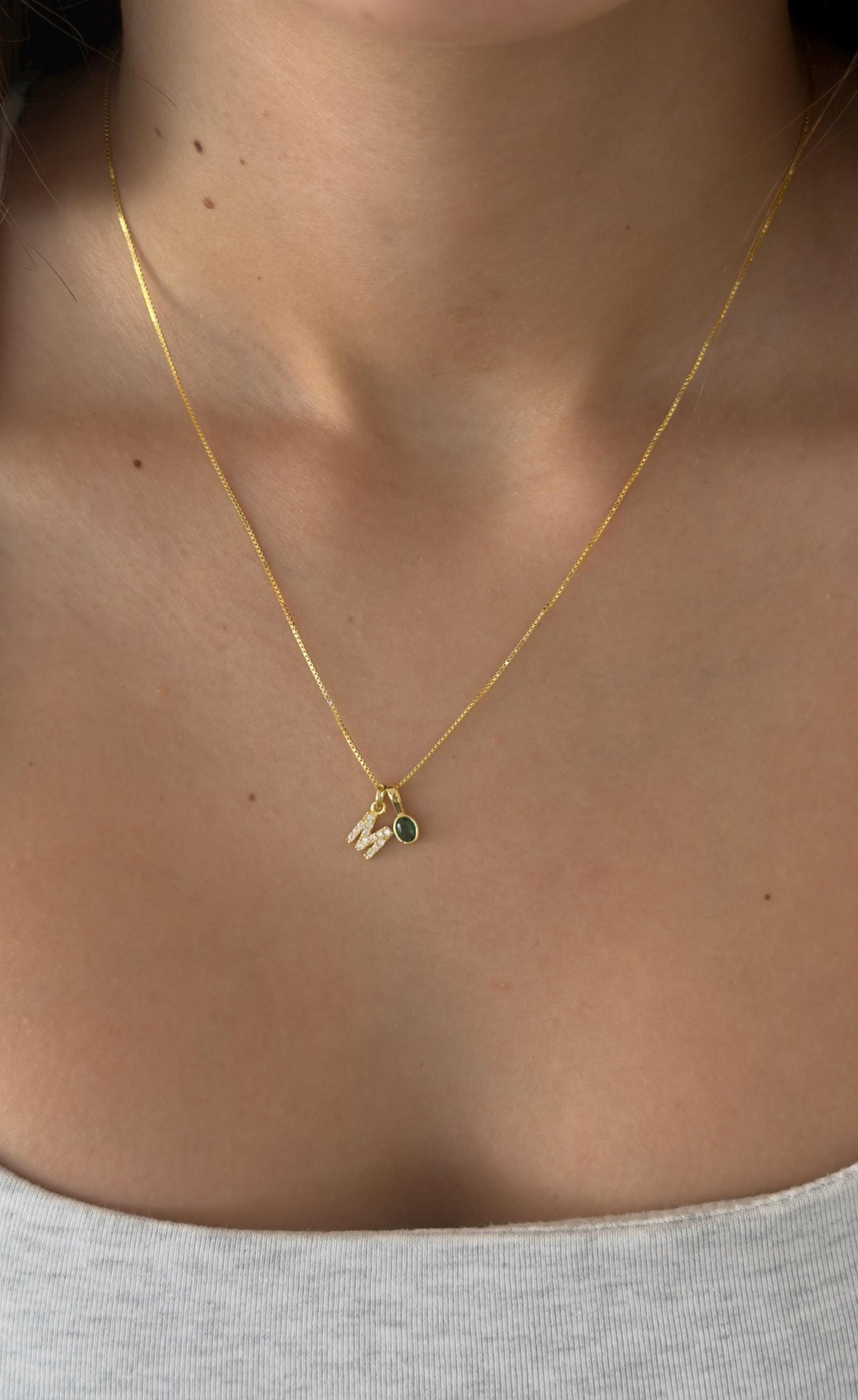 Pav√© CZ initial necklace with colorful gemstone charm