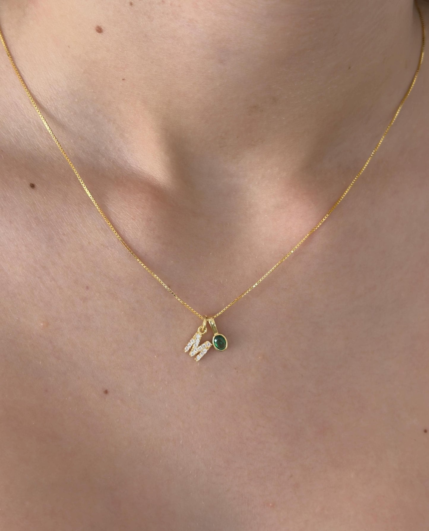Sterling silver initial necklace with green emerald oval stone