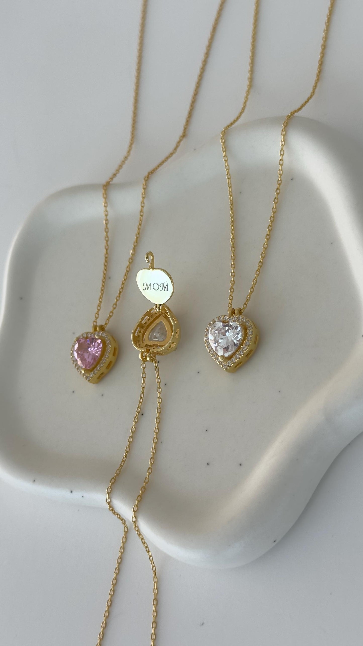 Engraved solitaire name necklace in 14K gold plated sterling silver with CZ diamond heart pendant.