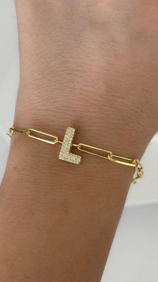 Custom gold link paperclip chain bracelet with sparkling cubic zirconia bubble diamond letter charm, handmade personalized jewelry.