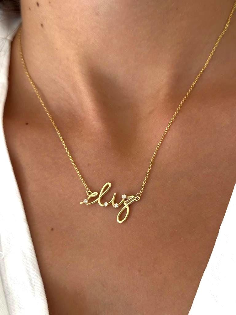 Sterling silver custom signature necklace plated in 14K gold with CZ diamonds