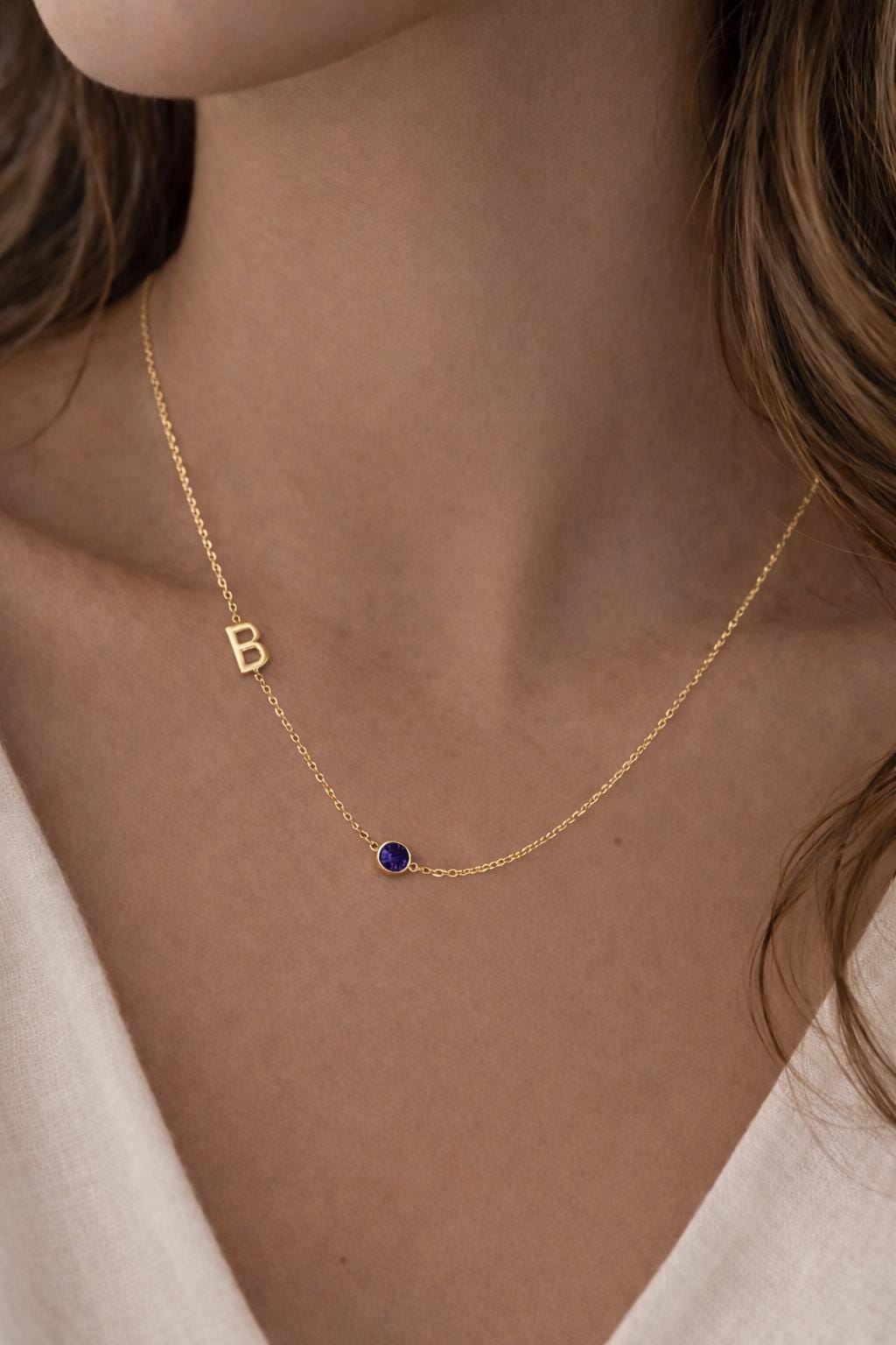 sapphire birthstone initial necklace model photo