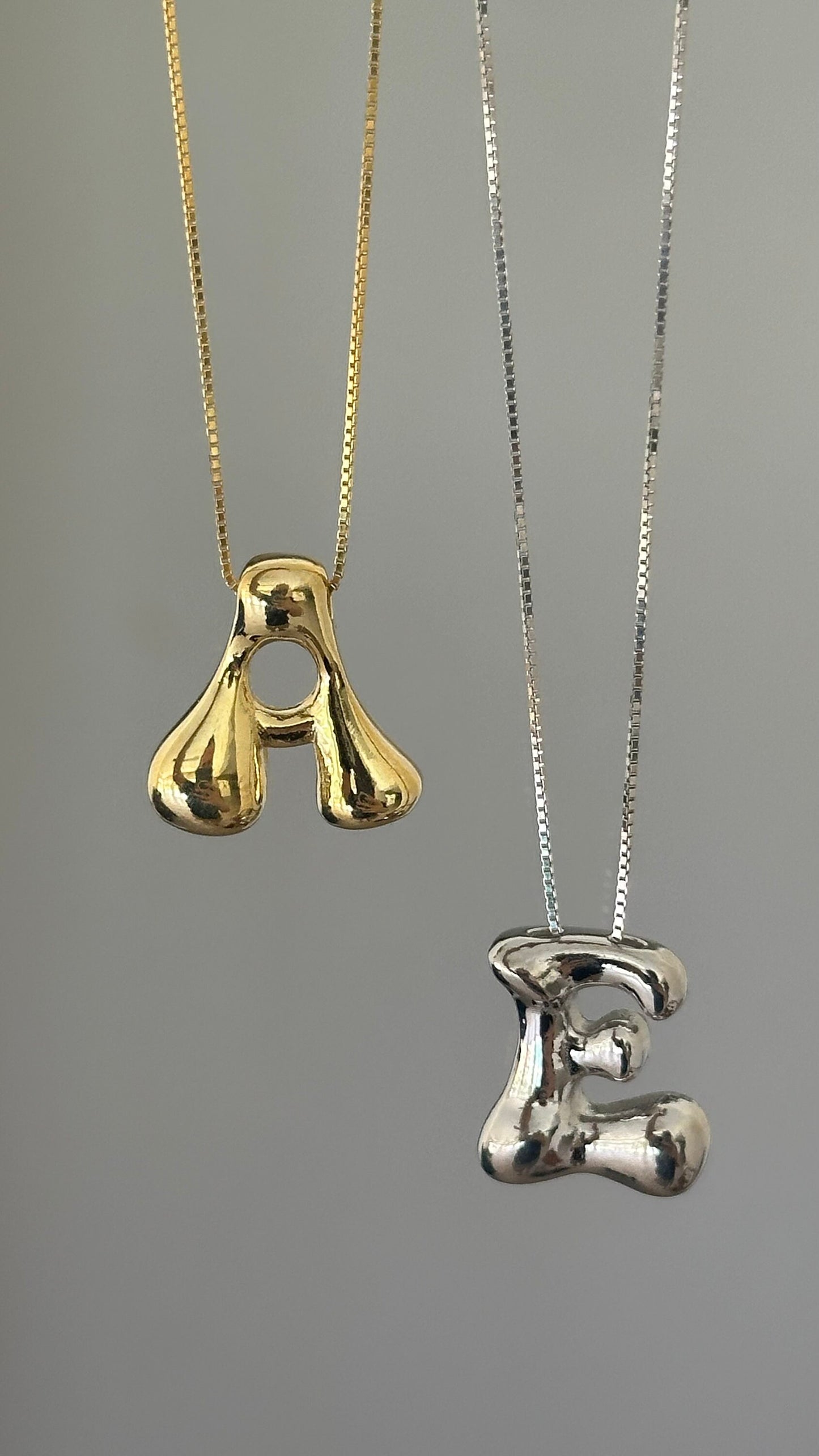 Balloon style initial necklace close up
