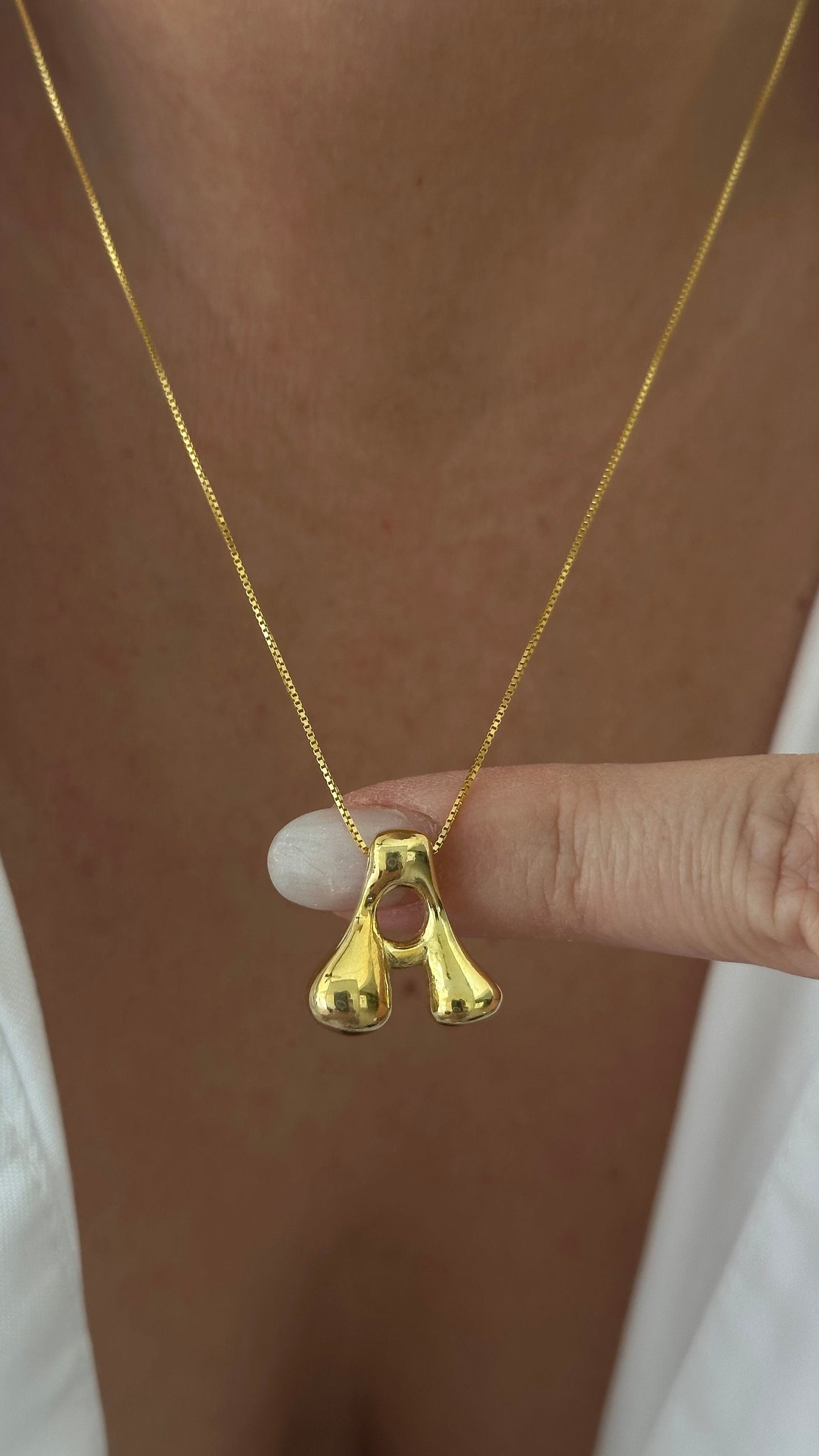 Gold puffy letter necklace minimalist style