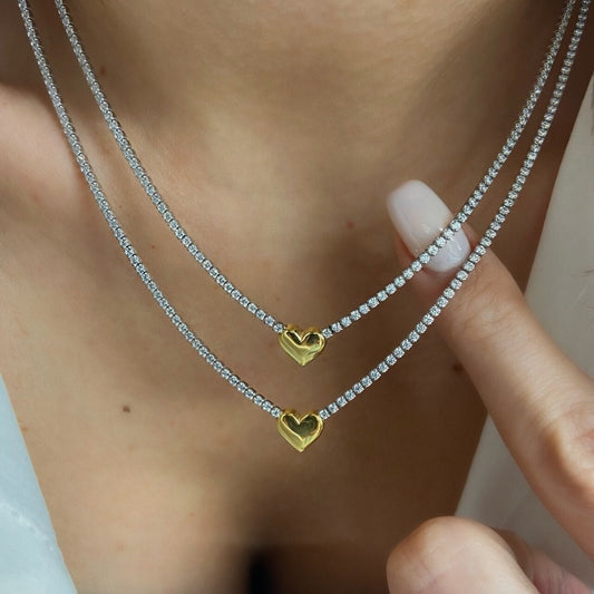 Sterling silver tennis necklace with sparkling cubic zirconia and 3D heart pendant