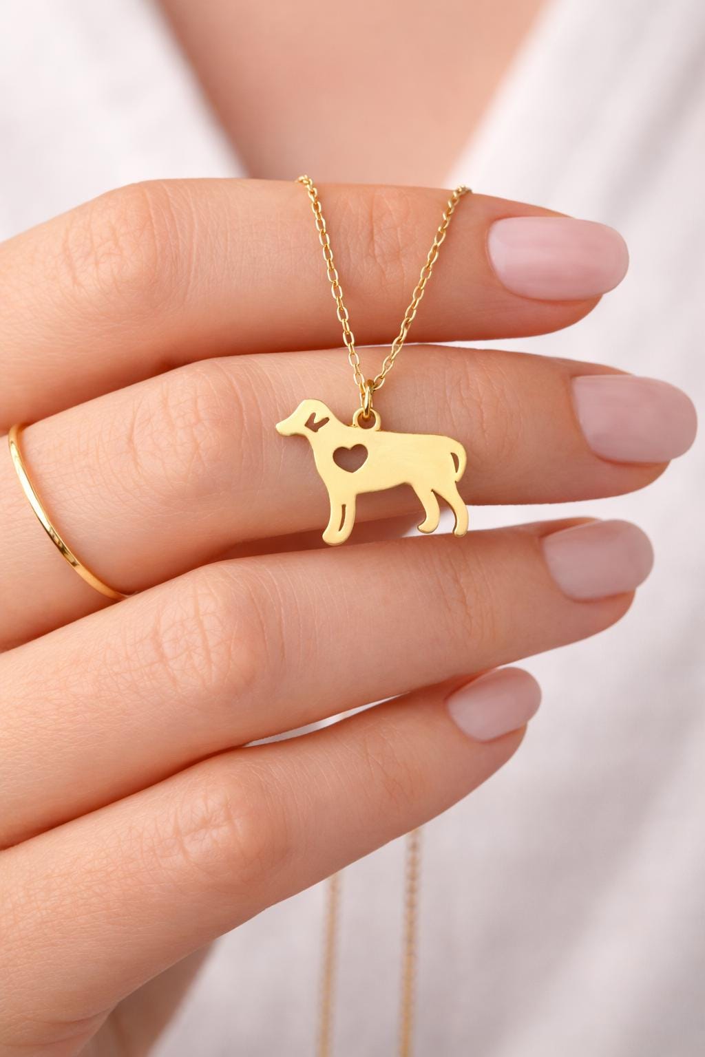 Elegant pet keepsake jewelry with paw, dog, cat, and winged cat pendants