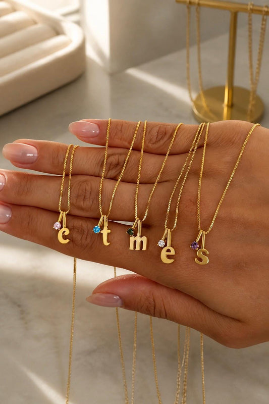 Gold initial birthstone necklace featuring custom letter pendants and birth month gemstones, minimalist personalized jewelry gift for mom daughter sister
