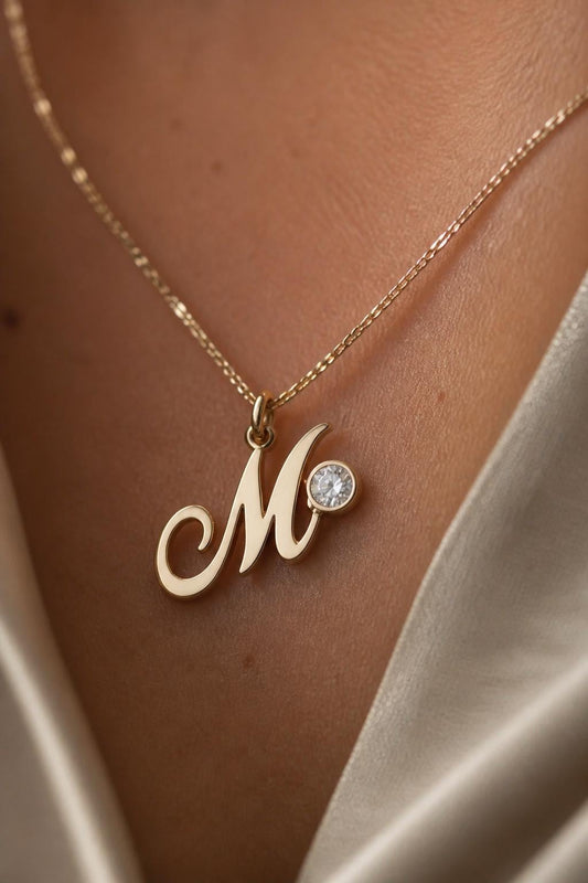 Personalized initial necklace in 925 sterling silver with 14K gold plating, dainty letter pendant necklace featuring a sparkling CZ diamond, elegant everyday jewelry gift for women.
