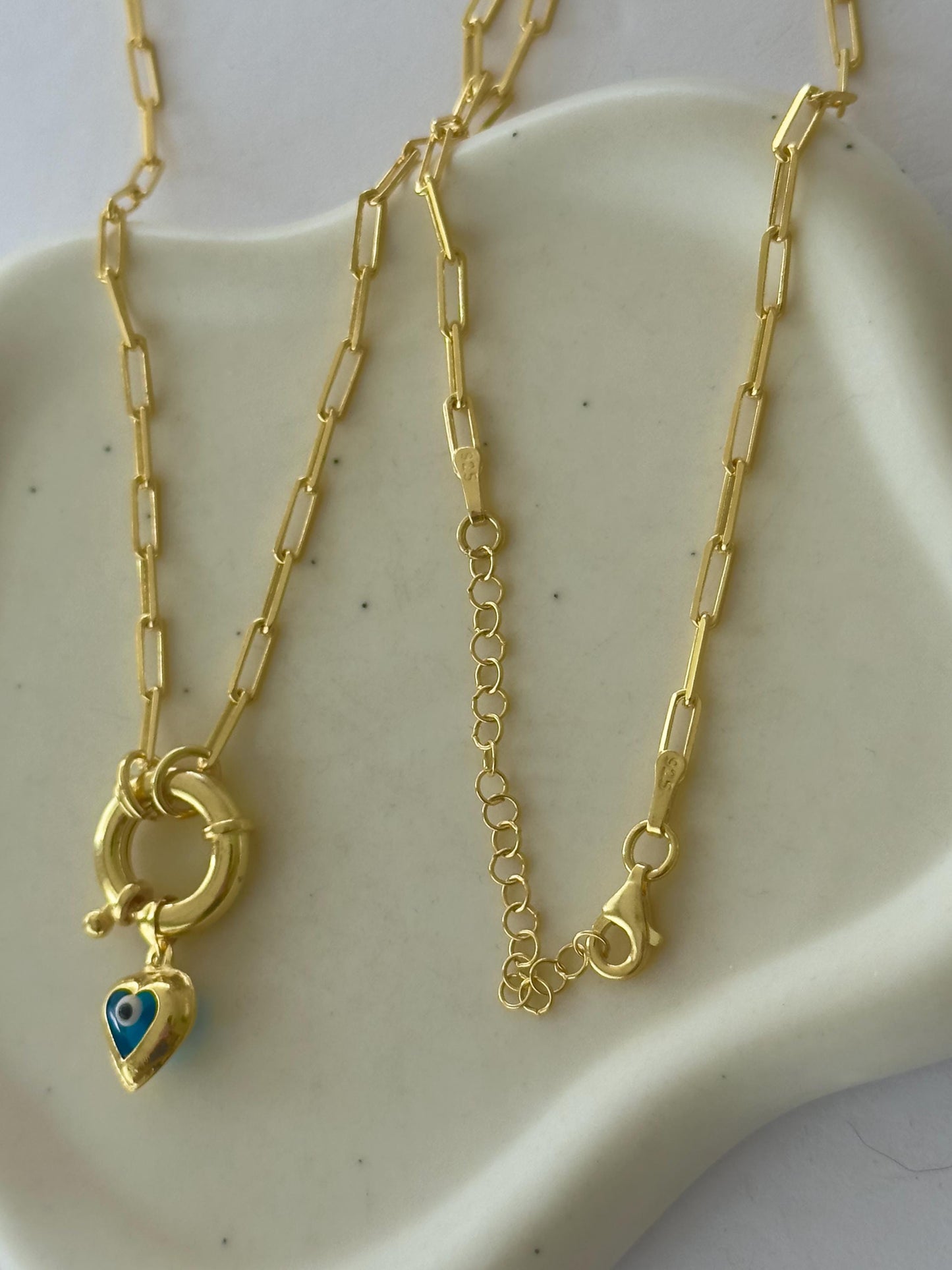 Elegant protection jewelry necklace with heart pendant on silver chain