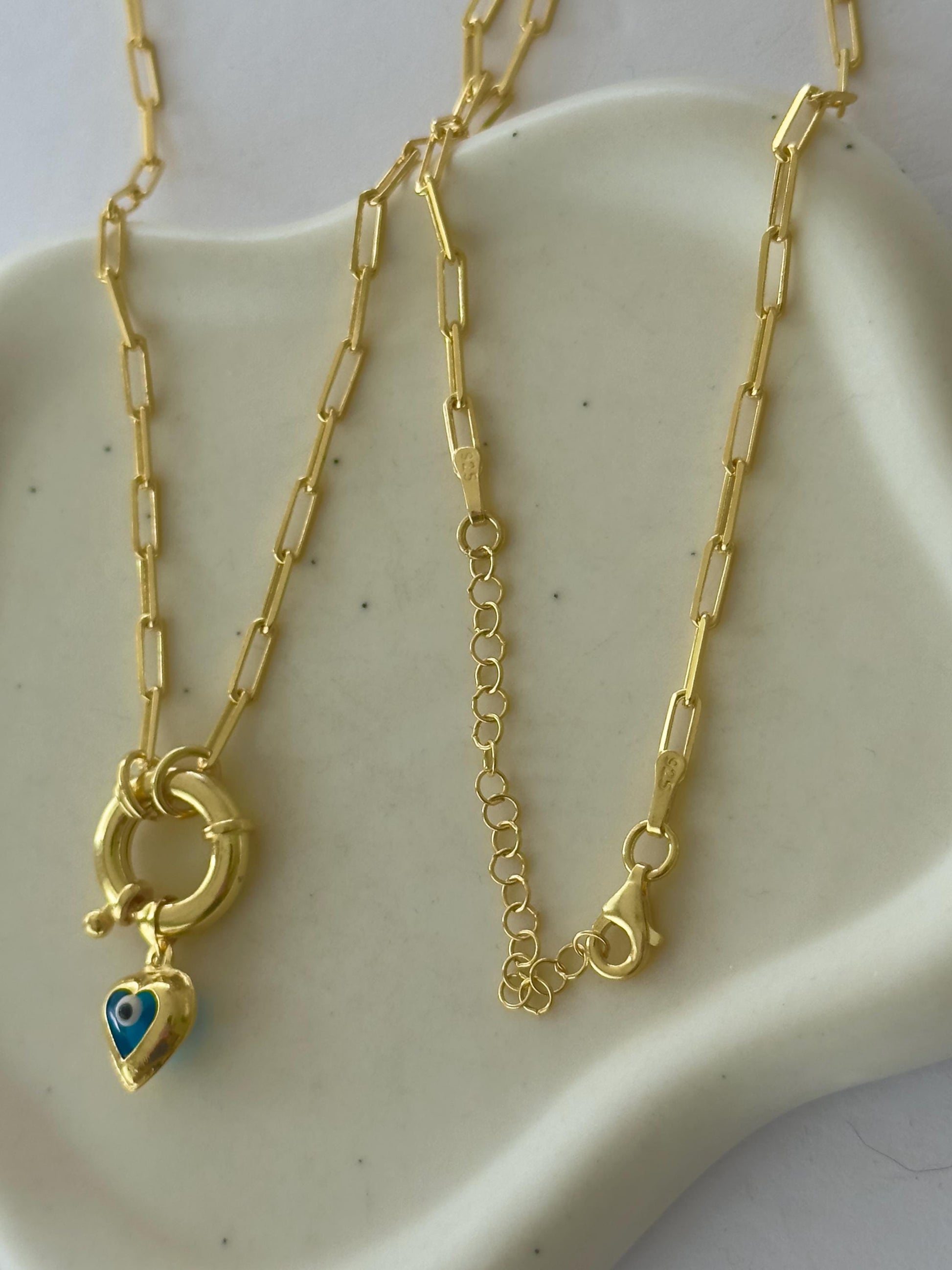 Elegant protection jewelry necklace with heart pendant on silver chain